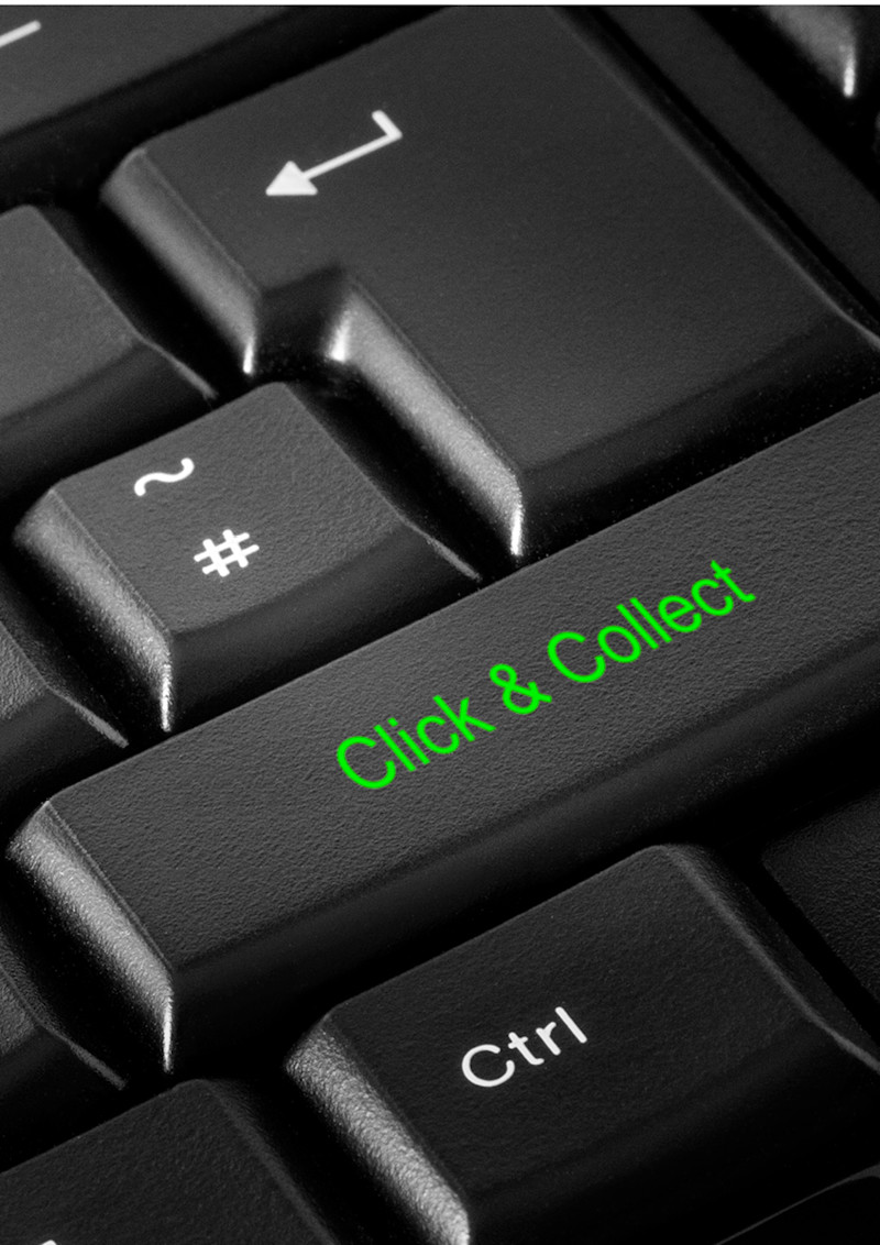 Nærbilde av svart tastatur med en stor tast merket "Click & Collect" i grønn tekst.